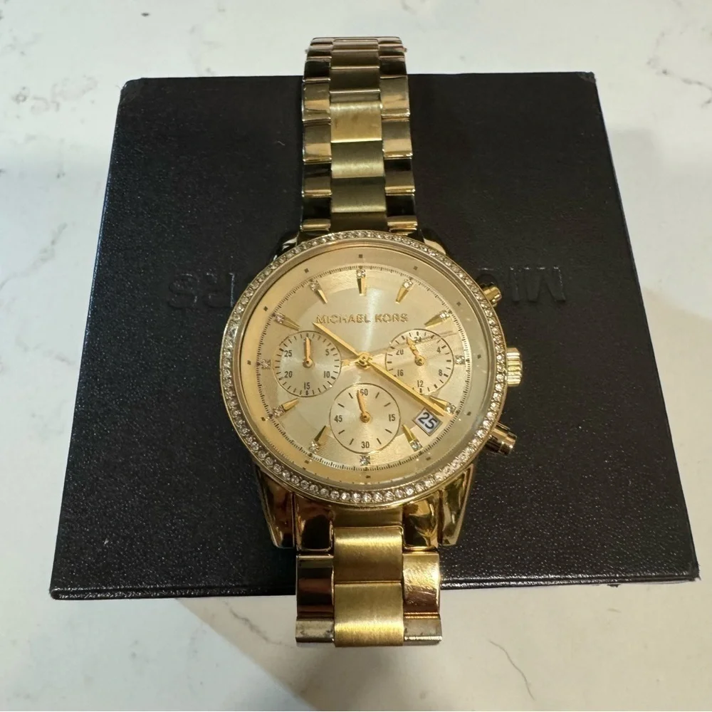 Michael Kors gold watch diamond style outer circle, stainless steel MK6356.
